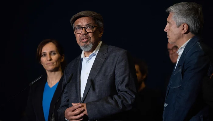WHO Director-General Tedros Adhanom Ghebreyesus (C) is flanked by Spains Minister of the Interior Fernando Grande-Marlaska (R) and Spains Minister of Health Monica Garcia Gomez speaks to reporters at a command post which is to coordinate evacuation efforts of the passengers and crew of the hantavirus-stricken cruise ship MV Hondius at the industrial port of Granadilla de Abona on the island of Tenerife in Spains Canary Islands on May 9, 2026. — AFP