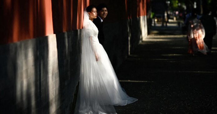 Young Chinese facing ‘life pressure’ resist government push to boost marriage rate
