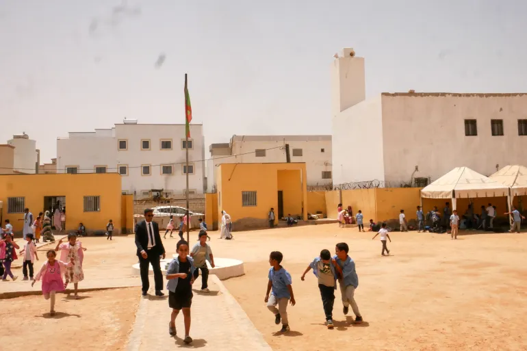 Pupils play at closing time at a public school in Nouakchott