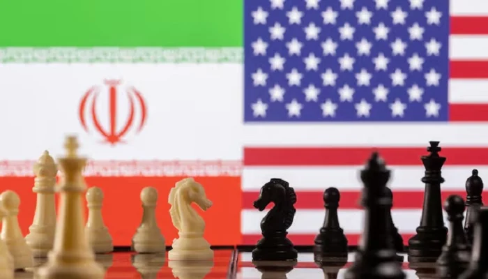 Chess pieces are seen in front of displayed Irans and US flags in this illustration taken January 26, 2022.— Reuters