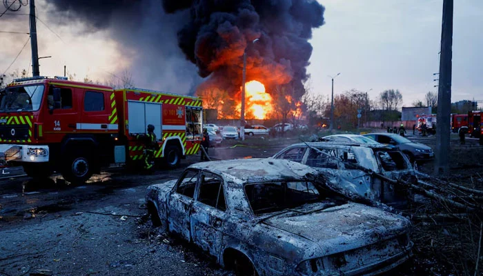 This representational image shows firefighters work next to destroyed vehicles, at the site of a Russian missile strike, amid Russias attack on Ukraine, in Kyiv, Ukraine, April 16, 2026. — Reuters