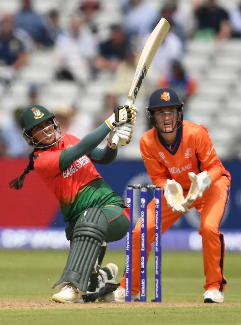 BIRMINGHAM, ENGLAND - JUNE 14: Juairiya Ferdous of Bangladesh bats watched by Babette de Leede during the ICC Women's T20 match between Bangladesh and Netherlands at Edgbaston on June 14, 2026 in Birmingham, England. (Photo by Philip Brown/Getty Images)