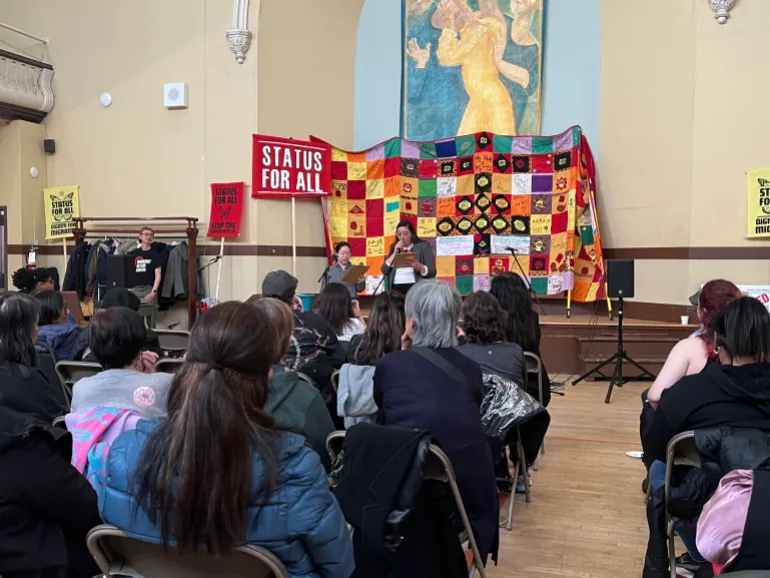 Luisa Ortiz-Garza, a migrant rights organiser at Parkdale Community Legal Services, speaks during an event in Toronto, Canada