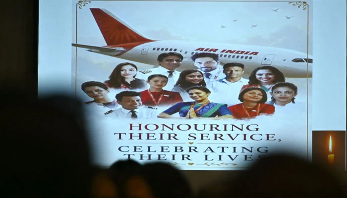 Family members of the crew of Air India Flight 171 plane crash pay tribute during a memorial service on its first anniversary, in Mumbai on June 12, 2026.— AFP