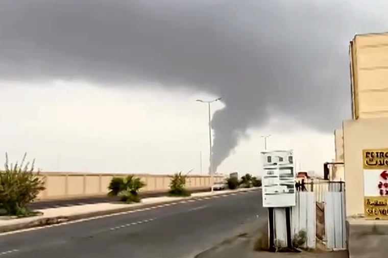 Plume of smoke rise in Jizan, Saudi Arabia, as Yemen's Iran-aligned Houthis said Saturday they carried out operations targeting Saudi Aramco facilities.