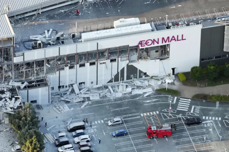 An aerial view shows the damaged Aeon Mall shopping centre