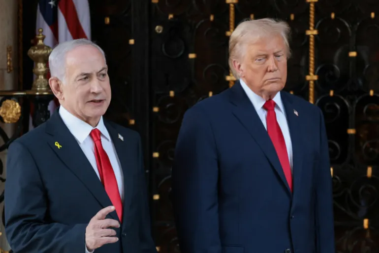 Israeli Prime Minister Benjamin Netanyahu speaks to the media as he is welcomed by U.S. President Donald Trump for meetings at the Mar-a-Lago club in Palm Beach, Florida, U.S., December 29, 2025. REUTERS/Jonathan Ernst