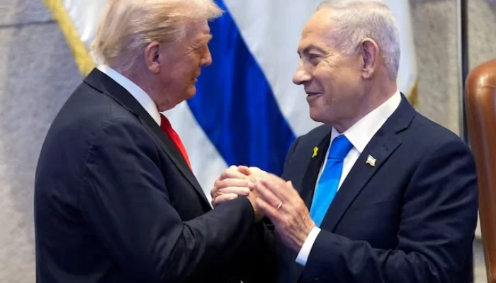 President Donald Trump talks with Israels Prime Minister Benjamin Netanyahu at the Knesset, Monday, Oct. 13, 2025, in Jerusalem. — Reuters