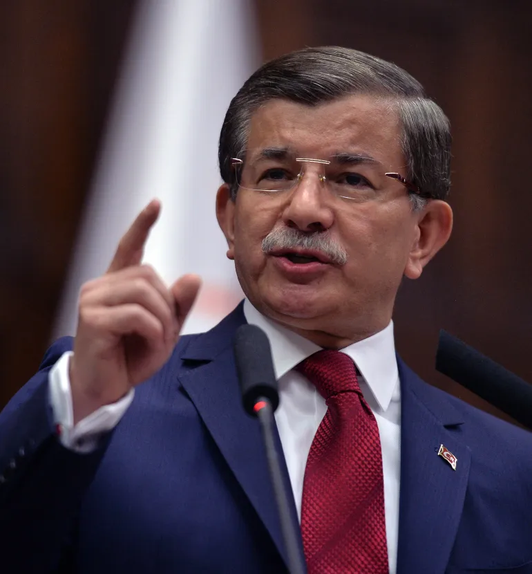 Turkey's Prime Minister Ahmet Davutoglu addresses his lawmakers at the parliament in Ankara, Turkey, Tuesday, May 3, 2016. Long-denied tensions between Turkey’s president Recep Tayyip Erdogan and prime minister Davutoglu are beginning to surface publicly, leading to speculation that the country’s powerful leader may be considering replacing the premier with a figure more willing to take a backseat role. (AP Photo)