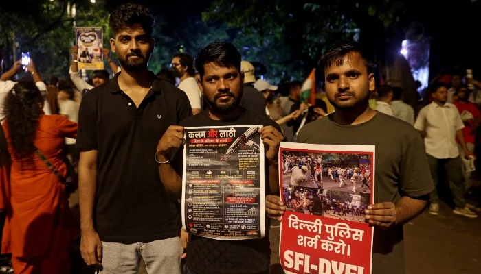 Ashok Kumar, 25, a civil service aspirant, and his friends attend a protest, days after thousands of protesters marched towards parliament demanding the resignation of Education Minister Dharmendra Pradhan over examination paper leaks, at Jantar Mantar in New Delhi, India, July 24, 2026. — Reuters