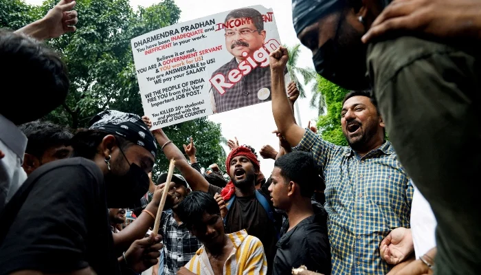 Supporters of Indias Cockroach Janta Party (CJP) celebrate after Indias Education Minister Dharmendra Pradhan resigned following days of protests demanding his resignation over National Eligibility cum Entrance Test (NEET) examination paper leaks, in New Delhi, India, July 25, 2026. — Reuters