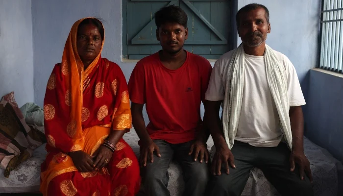Abhishek Kumar, 20, who recently appeared for a medical entrance test, poses for a photograph with his parents at their home in Sitamarhi, Bihar, India, July 29, 2026. — Reuters
