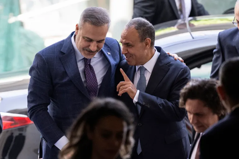 epa13053663 Egyptian Foreign Minister Badr Abdelatty (R) welcomes Turkish Foreign Minister Hakan Fidan (L) before a quadrilateral meeting at Tahrir Palace in Cairo, Egypt, 21 June 2026. EPA/MOHAMED HOSSAM