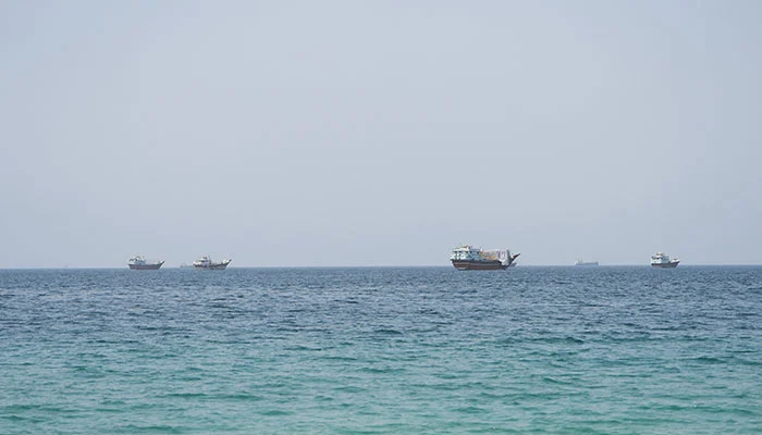 Vessels near the Strait of Hormuz, as seen from Musandam, Oman, August 6, 2026. — Reuters