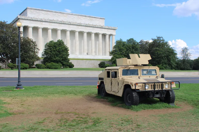 A National Guard military vehicle parked outside of the Lincoln Memorial on August 7