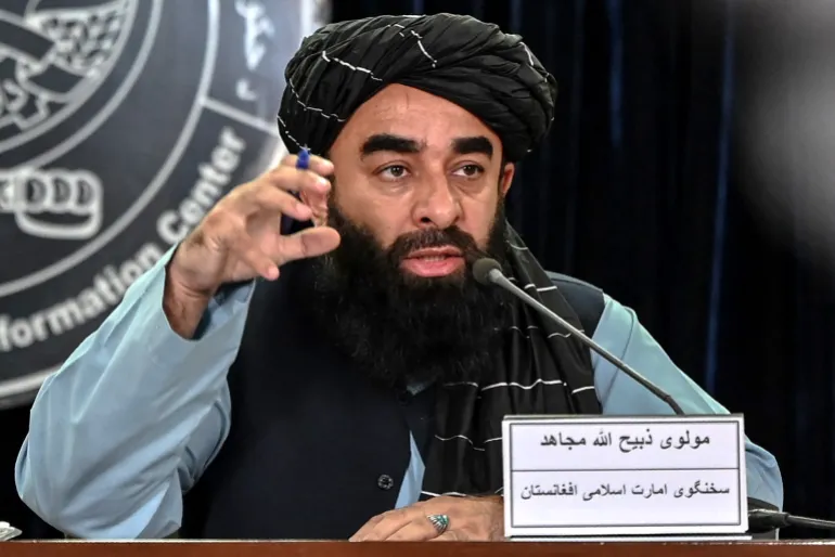Taliban government spokesman Zabihullah Mujahid speaks during a press conference in Kabul on October 12, 2025. Key border crossings between Pakistan and Afghanistan were closed on October 12 after fierce clashes erupted overnight following Taliban accusations that Islamabad had carried out air strikes this week, officials said. (Photo by Wakil KOHSAR / AFP)