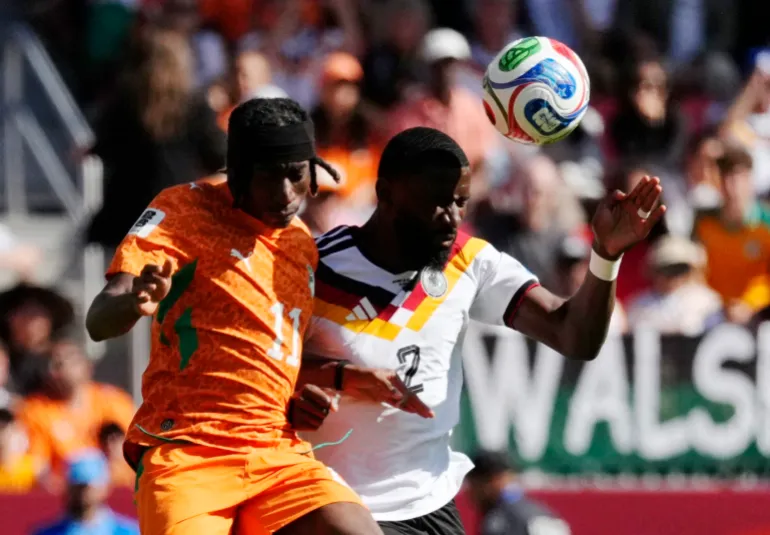 New Real Madrid teammates Yan Diomande of Ivory Coast in action with Germany’s Antonio Rudiger at World Cup 2026