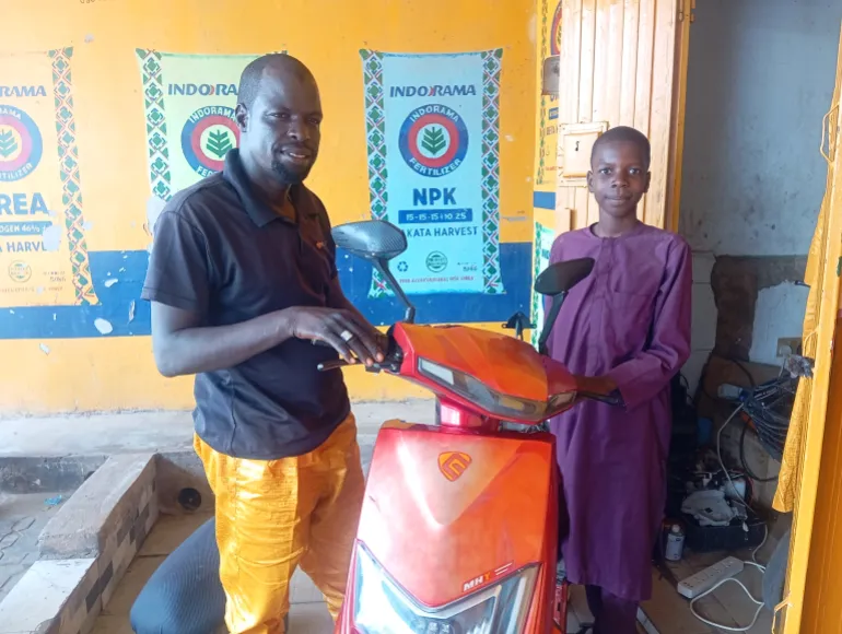 Hussaini Isa repairs electric motorcycles in Gombe, where demand for e-bikes is gradually growing amid rising petrol prices. [Muhammad Auwal Ibrahim/Al Jazeera]