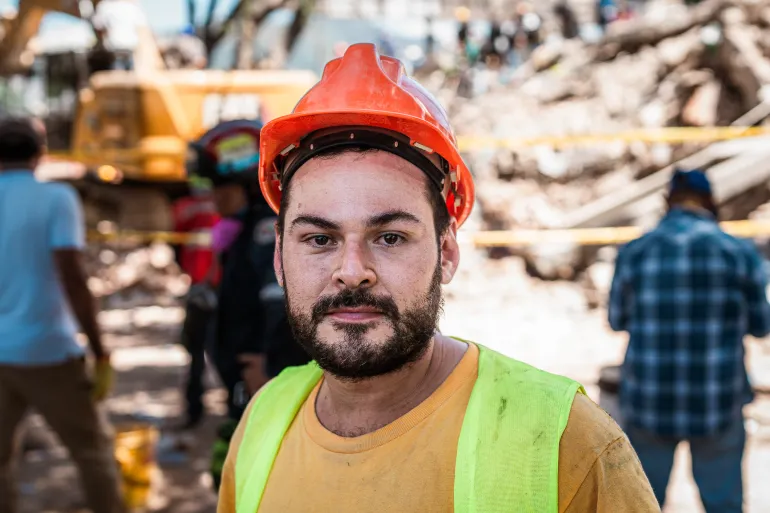 Maximiliano Herrera, 32, a local volunteer in Cali who has been assisting rescue efforts since the onset of the disaster. [Euan Wallace / Al Jazeera]
