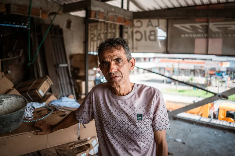 Néstor Martínez, whose bicycle shop in Buenaventura was damaged by the earthquake on August 10. He now estimates the damage will cost roughly 350 million COP (~$111,500 USD) to repair. [Euan Wallace / Al Jazeera]