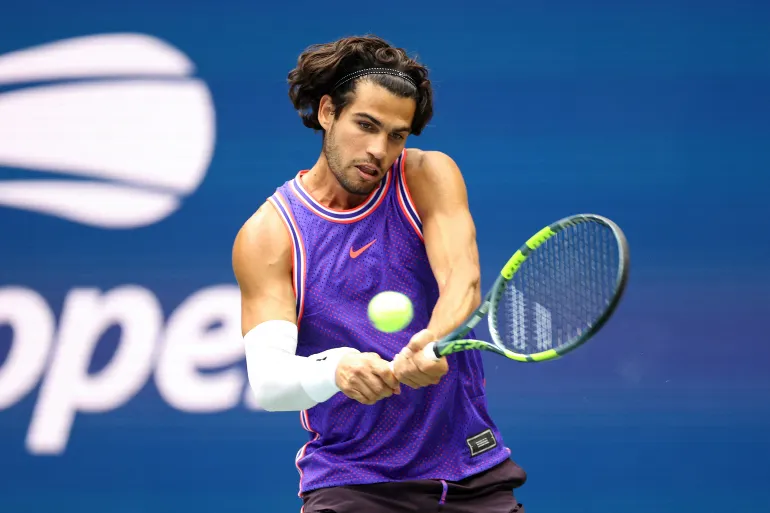 NEW YORK, NEW YORK - AUGUST 25: Carlos Alcaraz of Spain returns a shot with partner Serena Williams of the United States in their mixed doubles match against Erin Routliffe of New Zealand and Lloyd Glasspool of the United Kingdom during Fan Week at the USTA Billie Jean King National Tennis Center on August 25, 2026 in the Flushing neighborhood of the Queens borough of New York City. Sarah Stier/Getty Images/AFP (Photo by Sarah Stier / GETTY IMAGES NORTH AMERICA / Getty Images via AFP)