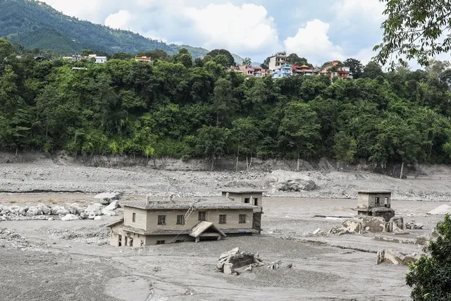 Trishuli market, covered in sludge, in Trishuli, Nepal [Mohammad Meherban/Al Jazeera]