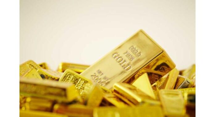 Gold hits near two-week low