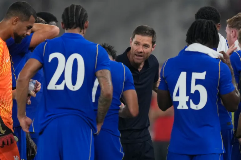 Xabi Alonso talks to his team during the preseason friendly football match between Chelsea and AC Milan