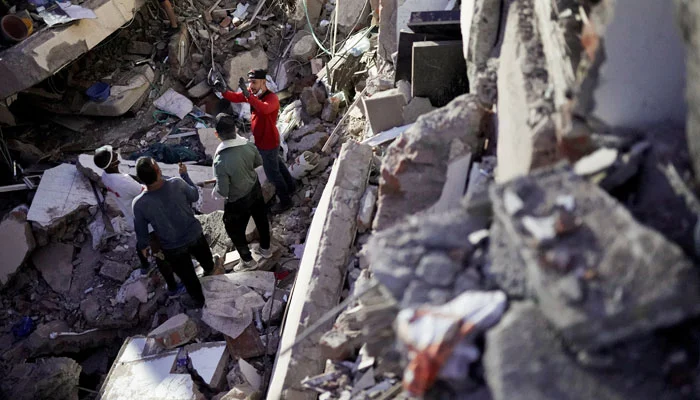 Rescuers work at the site of a collapsed building following an earthquake, in Cali, Colombia, August 10, 2026. — Reuters
