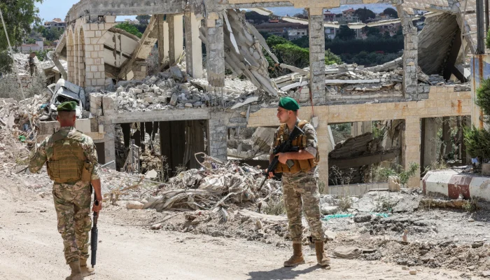 Lebanese soldiers stand guard in the town of Zawtar al-Gharbiyeh, after the withdrawal of Israeli forces under a US-mediated plan, in southern Lebanon, July 26, 2026. — Reuters