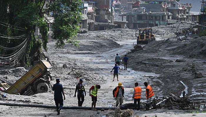 Rescue works continue at Trishuli Center in Nepals Nuwakot district on August 30, 2026, after catastrophic flooding on the Nepal-Tibet border. — AFP