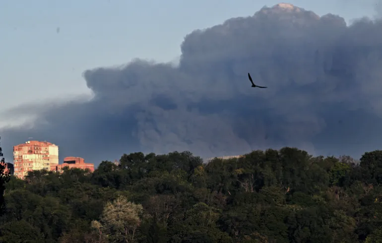 This photograph shows smoke rising following a drone strike in Kyiv on August 29, 2026, amid the Russian invasion of Ukraine, amid R