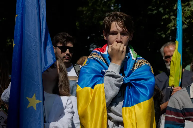 A protester reacts during a demonstration at the start of a parliamentary session on the appointment of Ukraine's new defense minister, in Kyiv on August 19, 2026, amid the Russian invasion of Ukraine.