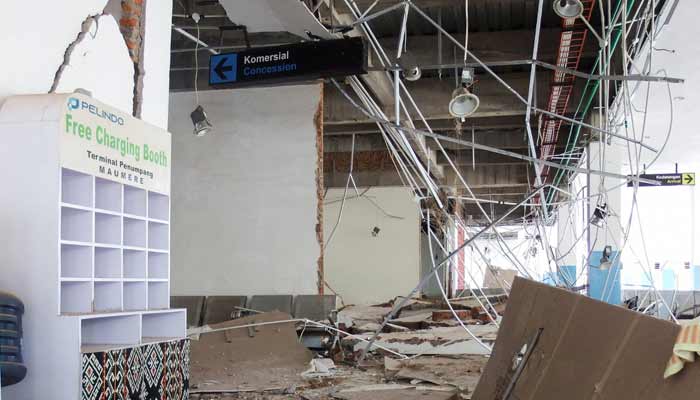 Phone charging booth sits among rubble at a heavily-damaged building at L. Say port following an earthquake in Maumere, Sikka, East Nusa Tenggara province, Indonesia, August 15, 2026.— Reuters