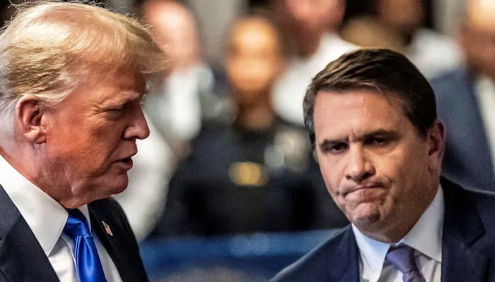 Former US President Trump walks alongside his attorney Todd Blanche in New York, New York, US, 30 May 2024.— Reuters