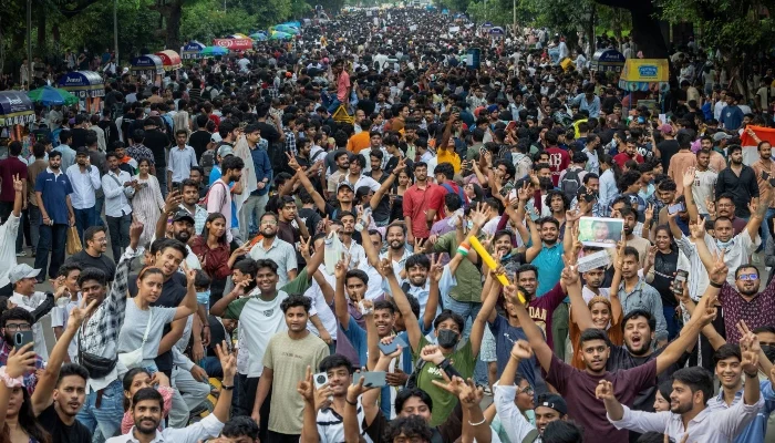 Thousands of protesters celebrated the resignation of Education Minister Dharmendra Pradhan in New Delhi, India, on July 25, 2026. — Reuters