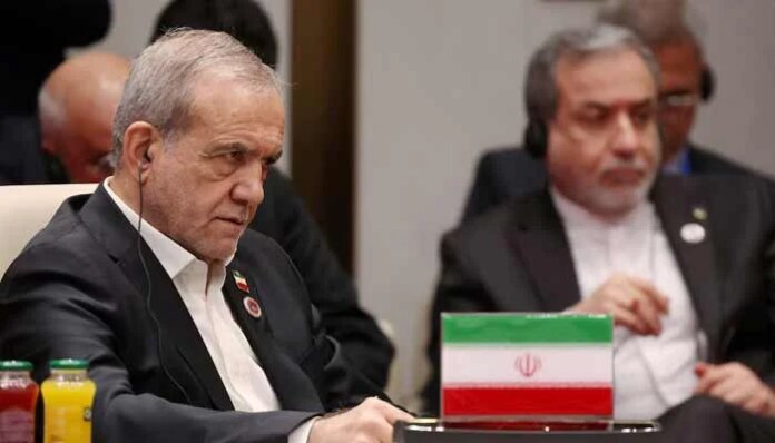 Iran urges US to comply with interim deal after Trump threatens further strikes