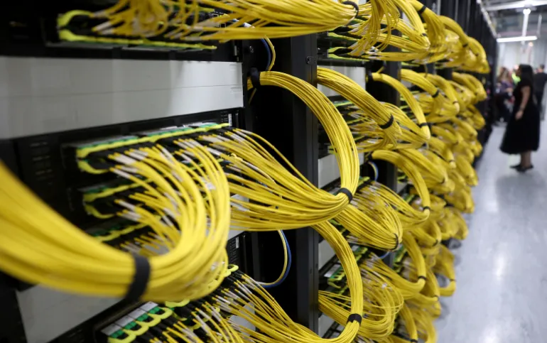 FILE PHOTO: Racks for data servers, GPUs and CPUs inside the Nebius AI UK data centre, a new facility hosting NVIDIA and other computer firms, at Ark Data Centres, in Chertsey, Britain, November 6, 2025. REUTERS/Toby Melville/File Photo