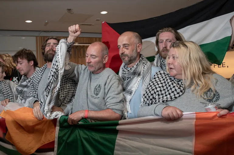 DUBLIN, IRELAND - MAY 23: Freedom Flotilla activists pose before delivering a statement at Dublin Airport. From left: Joshua St Leger, Adam Fitzhenry Collier, Cormac O'Daly, Tom Deasy, Luke McMenamin and Tara Sheehy on May 23, 2026 in Dublin, Ireland. Fourteen Irish citizens were among the 430 international human rights activists intercepted by the Israeli military in international waters while sailing with the Global Sumud Flotilla to break the blockade on Gaza. Following intense international diplomatic pressure, the Irish delegation was deported from Israel to Turkey on 21 May 2026 (Photo by Natalia Campos/Getty Images)