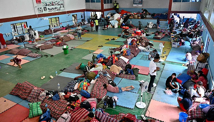 Flash flood survivors rest inside a relief shelter at Devighat in Nepals Nuwakot district on September 6, 2026. — AFP