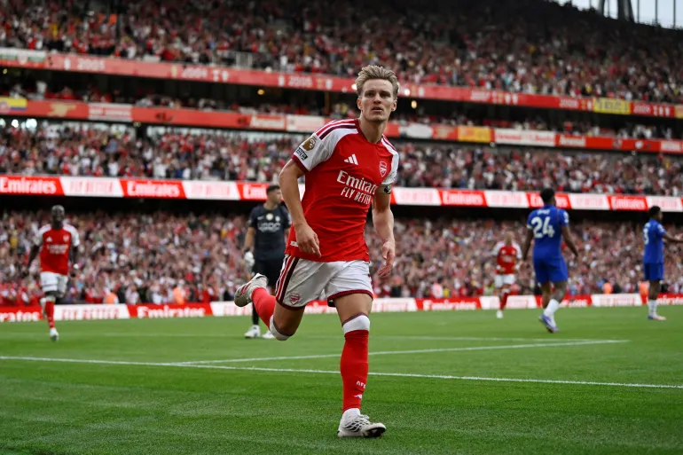 Soccer Football - Premier League - Arsenal v Chelsea - Emirates Stadium, London, Britain - September 6, 2026 Arsenal's Martin Odegaard celebrates scoring their second goal REUTERS/Tony O Brien EDITORIAL USE ONLY. NO USE WITH UNAUTHORIZED AUDIO, VIDEO, DATA, FIXTURE LISTS, CLUB/LEAGUE LOGOS OR 'LIVE' SERVICES. ONLINE IN-MATCH USE LIMITED TO 120 IMAGES, NO VIDEO EMULATION. NO USE IN BETTING, GAMES OR SINGLE CLUB/LEAGUE/PLAYER PUBLICATIONS. PLEASE CONTACT YOUR ACCOUNT REPRESENTATIVE FOR FURTHER DETAILS.. TPX IMAGES OF THE DAY