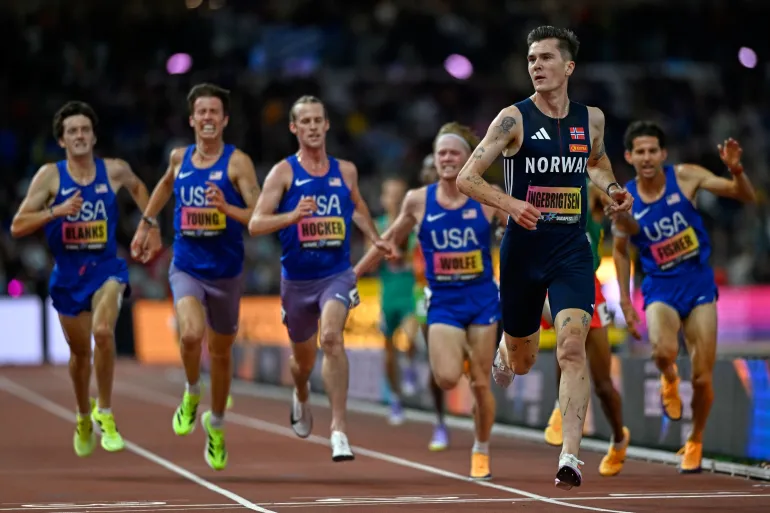 Jakob Ingebrigtsen, of Norway crosses the line to win the men's 5,000 meters final during the World Athletics Ultimate Championship in Budapest, Hungary, Friday, Sept. 11, 2026. (AP Photo/Denes Erdos)