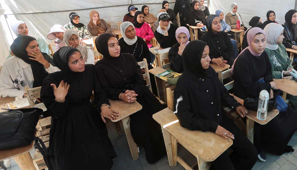 Displaced Palestinian student Samar Abu Salmi, 15, sits with other female students inside a tent classroom in Khan Younis, in the southern Gaza Strip, September 20, 2026.— Reuters