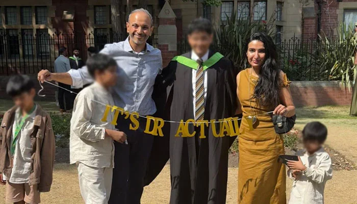 Areeba Hanif and her husband Omer Tariq pose for a group photo with their children. — Reporter/File