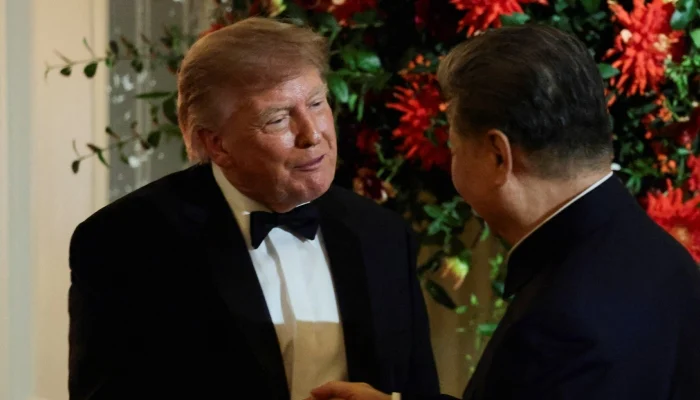 US President Donald Trump shakes hands with Chinese President Xi Jinping during a state dinner at the White House in Washington, DC, US, September 24, 2026. — Reuters