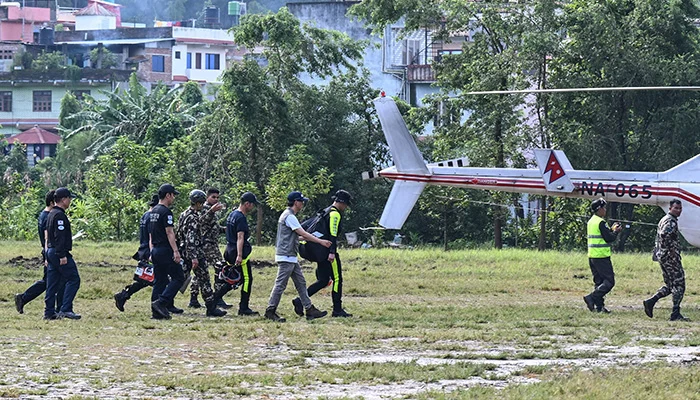 A rescue team leaves to a flooded area in the aftermath of flash floods in Trishuli, Nepals Nuwakot district, on September 6, 2026. — AFP
