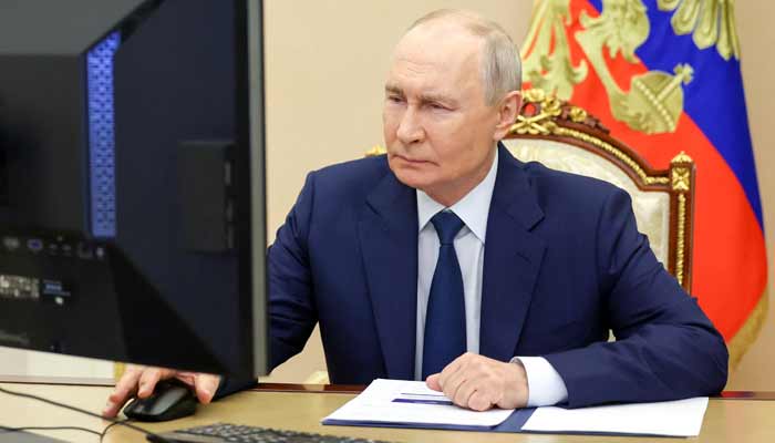 Russian President Vladimir Putin votes online in the parliamentary election in Moscow, Russia, September 18, 2026.— Reuters
