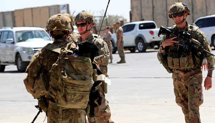 US soldiers are seen during a handover ceremony of Taji military base from US-led coalition troops to Iraqi security forces, in the base north of Baghdad, Iraq August 23, 2020. — Reuters