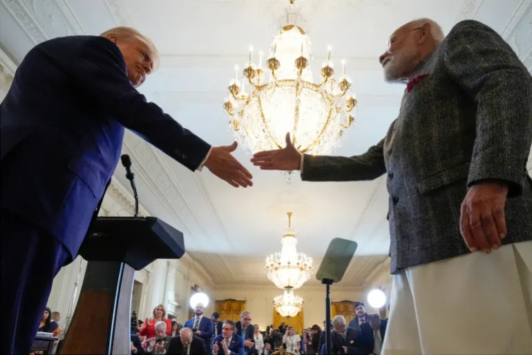 President Donald Trump and India’s Prime Minister Narendra Modi shake hands during a news conference in the East Room of the White House, Thursday, February 13, 2025, in Washington.